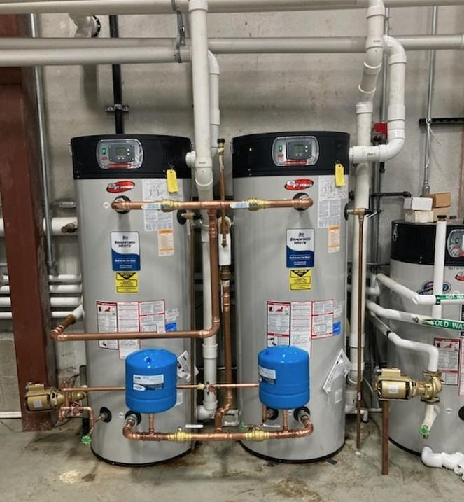Pair of Bradford White commercial water heaters piped in copper with expansion tanks, installed by Viper